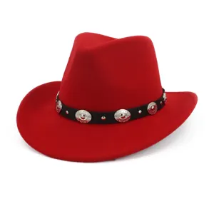 Red western cowboy hat close-up detail, black leather band with silver metal accents.