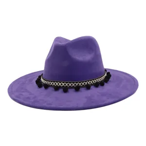Purple felt jazz hat detail showcasing ethnic style woven band and cute black pom-pom trim.