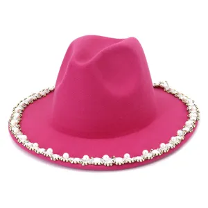 Close-up detail of the women pink wool fedora hat featuring elegant pearl and crystal brim trim.