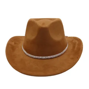 Detailed close up of brown suede western cowboy hat featuring elegant pearl rhinestone band.