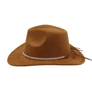 Close-up detail of the brown suede western cowboy hat featuring rhinestone pearl band and fringe.