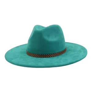 Teal suede fedora hat detail, featuring a brown geometric patterned band and wide flat brim.