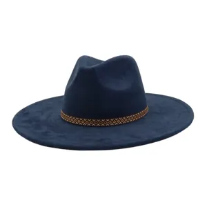 Detailed view of navy blue suede wide brim fedora hat with a stylish geometric woven band.