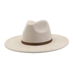 Beige suede fedora hat with brown geometric band, elegant wide brim gentleman hat detail.