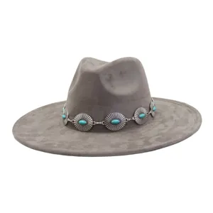 Grey suede fedora hat detail, wide flat brim with ethnic silver concho and turquoise stone band.