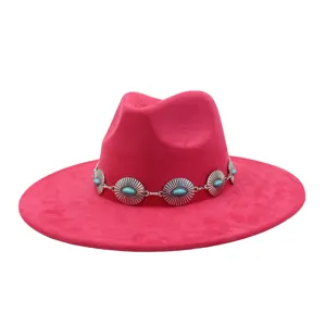 Pink suede fedora hat with turquoise metal band, wide flat brim western cowboy style detail.