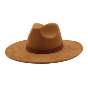 Classic brown soft faux suede wide brim fedora hat with ethnic leather band for winter.