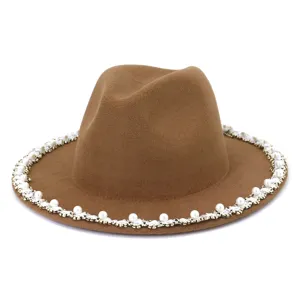 Detailed view of the elegant brown wool fedora hat featuring exquisite pearl and crystal brim trim.