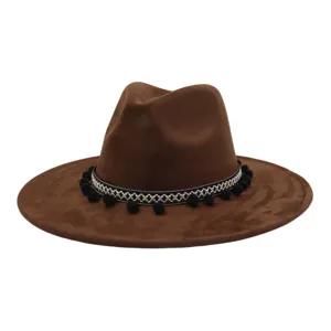 Brown suede flat brim fedora hat with ethnic pom pom woven band for men and women stylish.