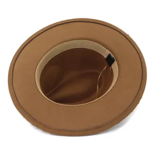 Close-up detail view of the brown wool fedora hat, showing inner lining and neat stitching.