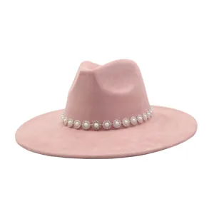 Pink suede fedora hat with pearl rhinestone band, elegant wide brim fashion headwear for women.