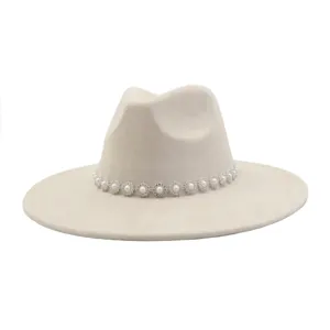 Elegant beige suede fedora hat for women and men, featuring a stunning pearl and rhinestone band.