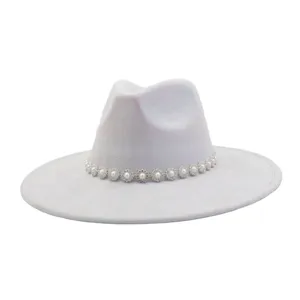 Close-up of light grey suede fedora hat featuring a delicate pearl rhinestone flower band.