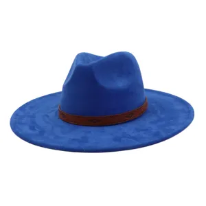 Close-up of the blue soft suede fedora hat showing its wide flat brim and ethnic patterned band.