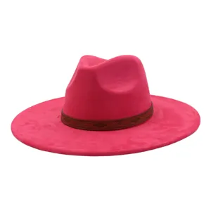 Pink faux suede jazz hat close-up, featuring a brown ethnic patterned band and wide flat brim.