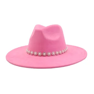 Pink suede fedora hat detail, elegant pearl rhinestone flower chain decor, wide brim accessory.