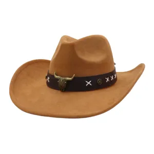 Close-up detail of vintage suede cowboy hat with metal bull skull and western style.