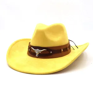 Yellow suede western cowboy hat with brown leather band and silver bull skull detail close up