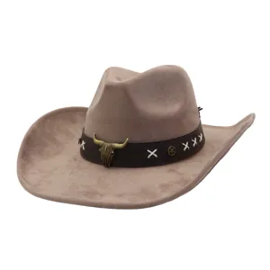 Vintage faux suede western cowboy hat with metal bull skull decor and wide brim detail.