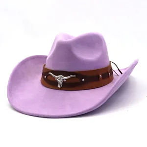 Close-up detail of the purple suede western cowboy hat with brown leather band and bull skull.