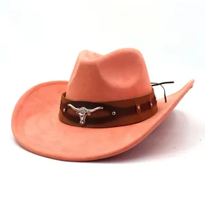 Pink faux suede western cowboy hat with brown leather band and metal longhorn skull detail.
