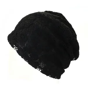 Detailed view of the black lace slouchy beanie, showing exquisite floral hollow-out texture.