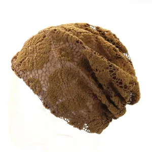Close-up detail of brown lace floral slouchy beanie, breathable mesh women fashion hat.
