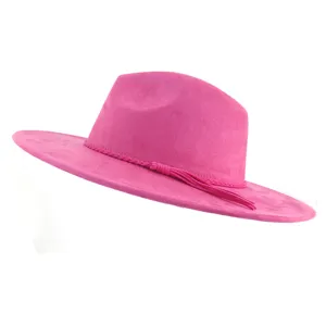 Pink suede fedora hat detail view showcasing the elegant braided band and tassel accent.