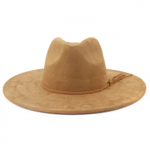 Close-up of brown suede fedora hat detail featuring a braided band and chic side tassel accent.