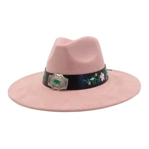 Pink suede wide brim fedora hat with floral embroidered black band and vintage metal buckle detail.