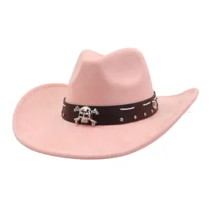 Pink suede cowboy hat detail, highlighting silver skull decoration and metal rivets.