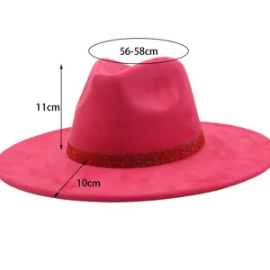 Detail view of pink suede fedora hat, featuring sparkling rhinestone band, 56-58cm size.