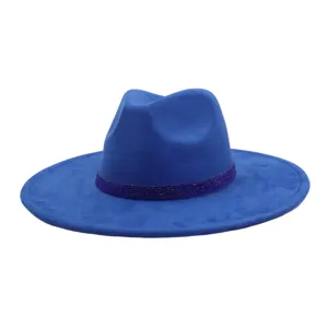 Close-up view of the blue suede fedora hat, highlighting the sparkling band detail and soft texture.