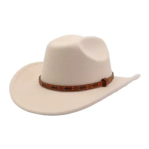 Detail view of beige wool felt cowboy hat with brown studded leather hat band trim.