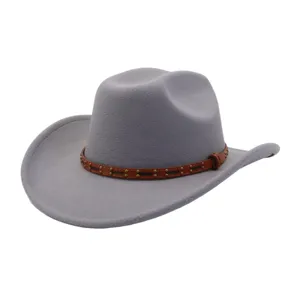 Grey wool cowboy hat detail, classic jazz hat design with brown leather strap and metal studs.