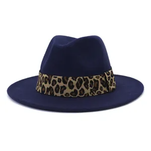 Detailed view of dark blue wool fedora hat with trendy leopard print band, premium finish.