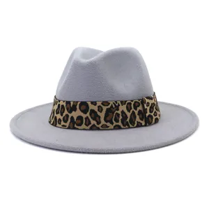 Grey wool fedora hat detail featuring leopard print ribbon band and wide flat brim style.