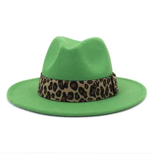 Green wool fedora hat featuring stylish leopard print band and flat brim, perfect for autumn.