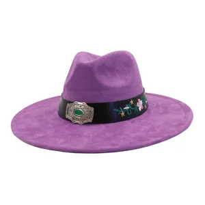 Detail view of a purple wide brim jazz hat, featuring a black embroidered band and silver buckle.