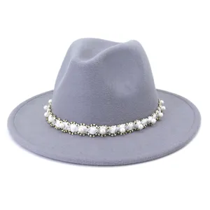 Grey wool fedora hat detail featuring an elegant pearl beaded band for autumn and winter fashion.
