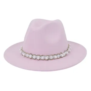 Close-up detail view of the pink felt fedora hat featuring an elegant pearl woven band trim.