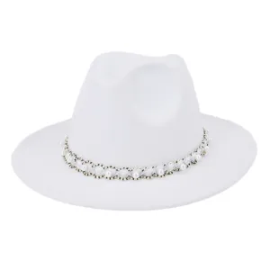 Detail shot of elegant white wool felt fedora hat with pearl and metallic braided band trim.