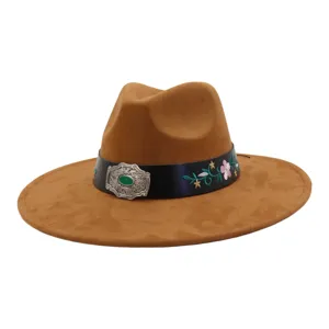 Brown suede fedora hat detail, featuring ethnic floral embroidery and vintage metal buckle.