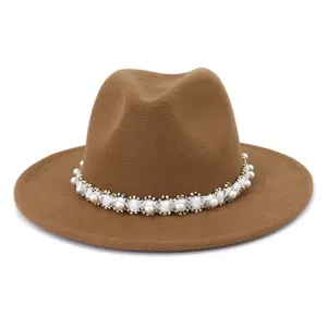 Stylish brown wool fedora hat featuring elegant pearl ribbon band, wide brim winter accessory.