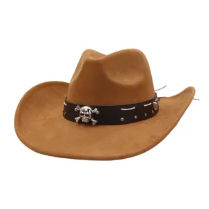 Detail shot of brown suede cowboy hat featuring metal skull badge, leather band and rivet accents.