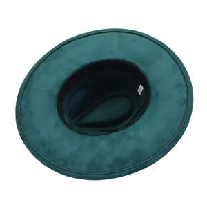 Dark green suede flat brim jazz hat detail view showing inner lining and texture quality.