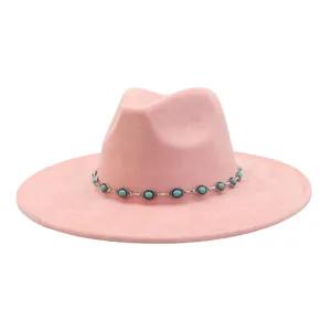 Pink suede fedora hat detail featuring a vintage silver turquoise metal chain band for women.