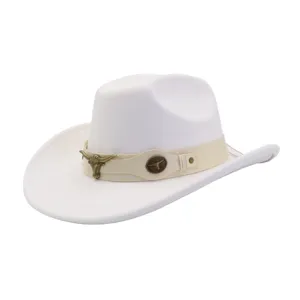 Close-up view of white felt western cowboy hat with beige leather band and metal bull head accessory.