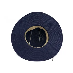 Chapeau de paille femme bleu marine a larges bords pour plage vacances protection UV.