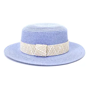 Detail view of blue flat top straw hat with woven band, perfect for summer sun protection.